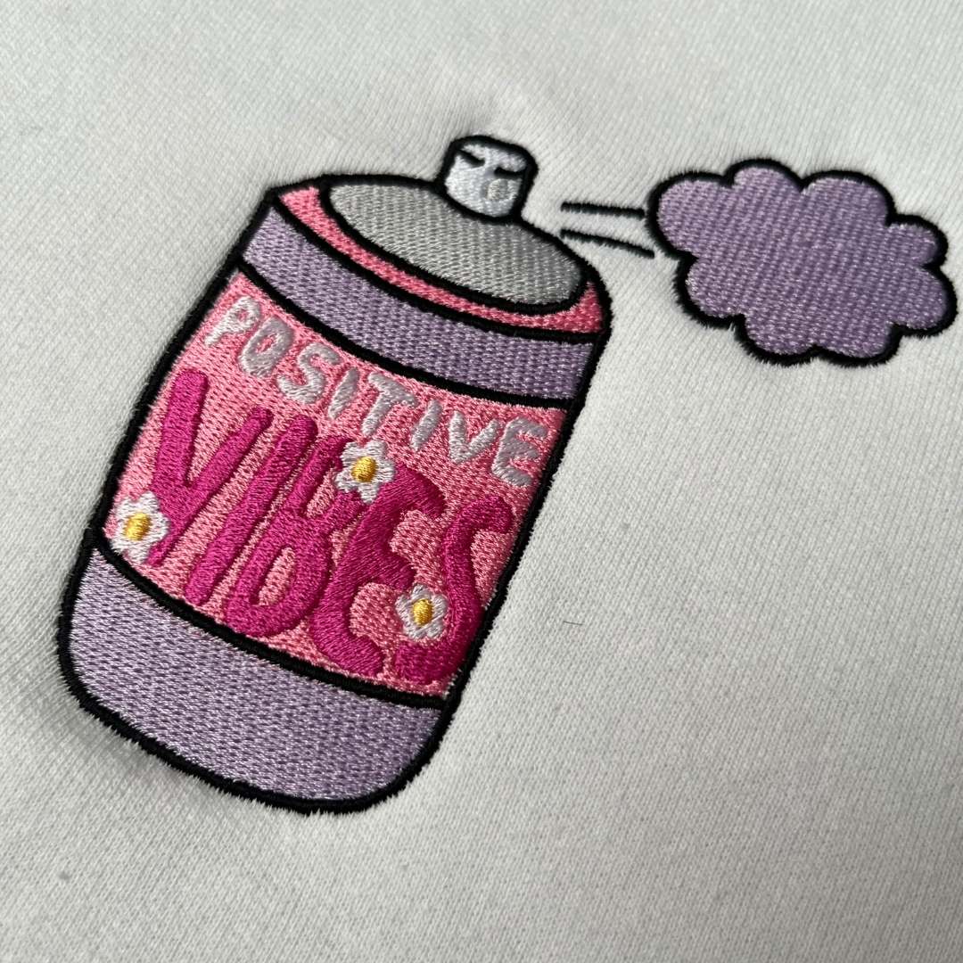 POSITIVE VIBES SPRAY CREWNECK