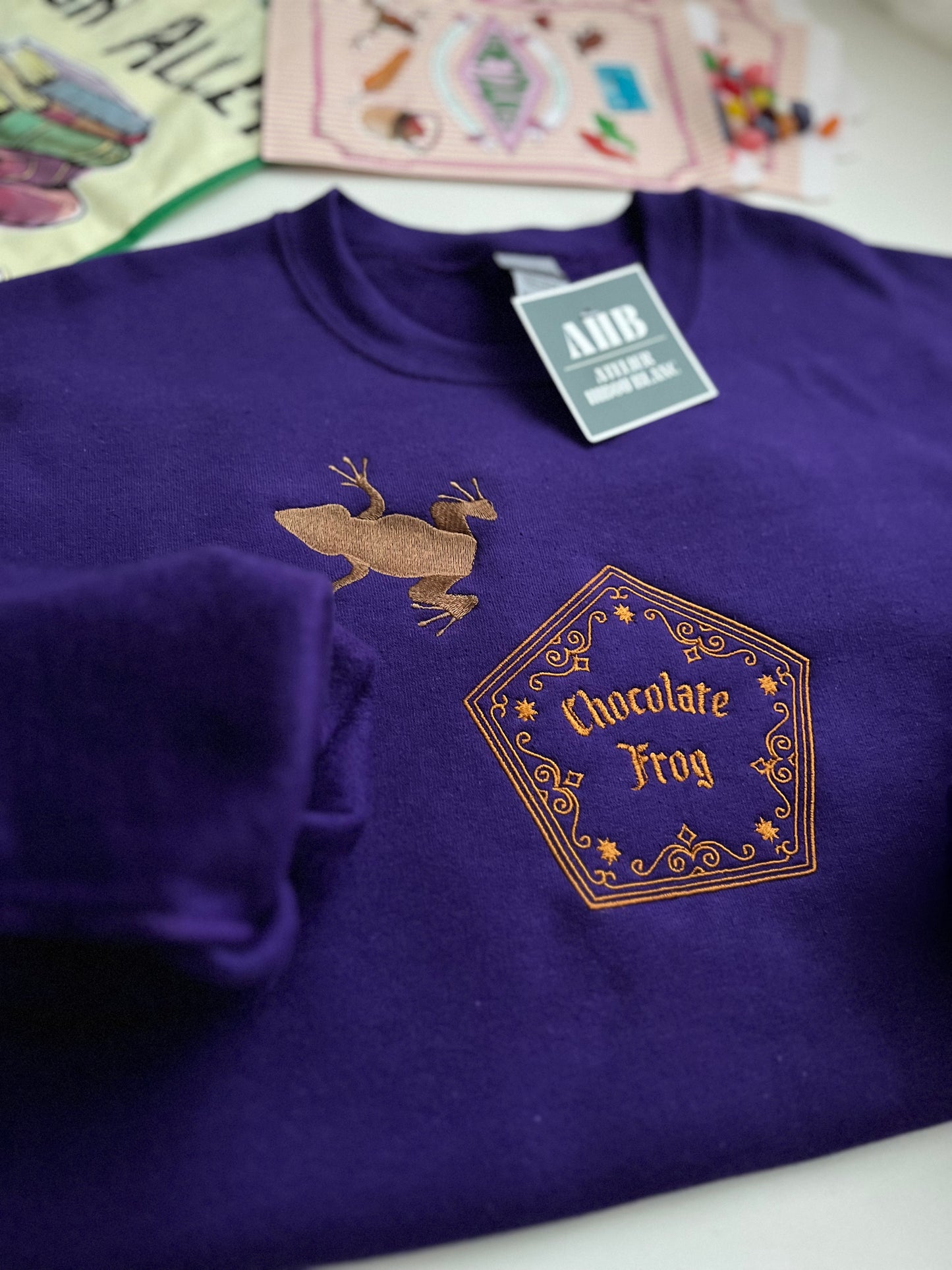 *PRE ORDER* CHOCO FROG + HONEYDUKES CREWNECKS